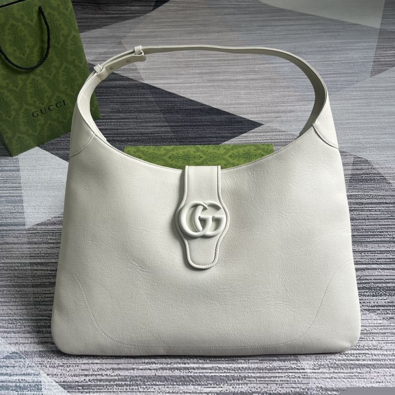 G*u*i top handle bags